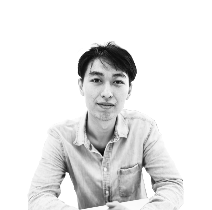 Man softly smiling in black and white